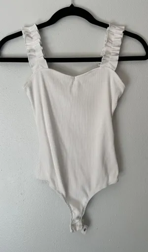 Francesca's Collections Ivory Ribbed Ruffle-strap Bodysuit thumbnail 1