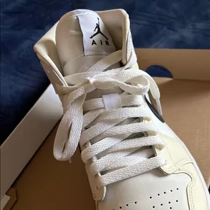 Nike Air Jordan 1 Mid Ivory and Black Shoes thumbnail 4