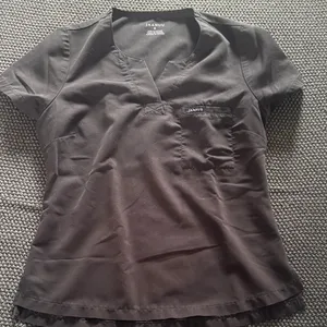 Jaanuu Black V-Neck Short Sleeve Medical Top thumbnail 1
