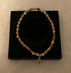 Neutral Multi-Bead Stretch Bracelet with Gold Cross Charm thumbnail 1