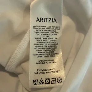 Babaton Aritzia Streamline Top Drapey Jersey Off the Shoulder Women XL White NWT thumbnail 12