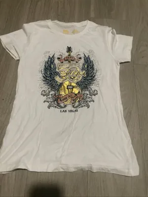 Hard Rock Cafe White Women's Graphic Tee with Gold & Blue Winged Guitar thumbnail 1