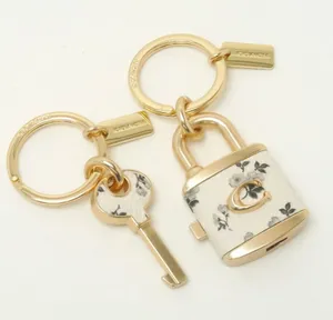 Coach keychain for women, key ring, lock, bag charm, leather floral pattern-RARE thumbnail 1