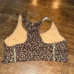 Fabletics L Athleisure cheetah on the go high impact sports bra thumbnail 3