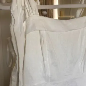 Dissh Aisle Pearl Bow Linen Mini Dress Size 6 Coastal Cowgirl graduation dress thumbnail 8