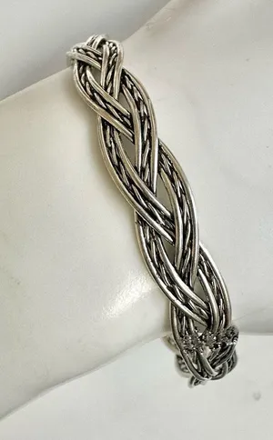 Silver tone braided bangle bracelet thumbnail 1