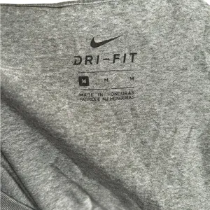 Casual Comfy Stretch Nike Women's Classic Dri-fit Gray Short Sleeve Gym T-Shirt thumbnail 8