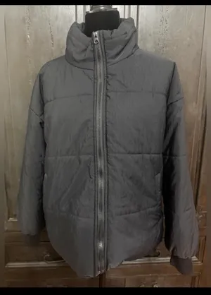 SHEIN Black puffy zip up Oversized coat w/bag - Size Medium. ***Refer to measurements. Fun oversized warm, lightweight and comfy. Gently warn & Excellent condition. Measurements approximately 24” from armpit to armpit x 23” long. Non-smoking home. priced to sell at as is condition. Don’t like my price, make reasonable offer! And thank you for checking my closet. thumbnail 1