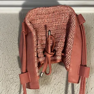 Free People Cabana Woven Drawstring Crossbody Bag in Pink thumbnail 5