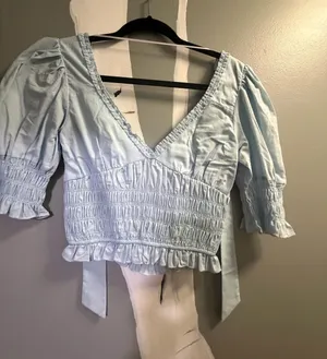 “Lime Lush” Light Blue Smocked V-Neck Womens Top thumbnail 1
