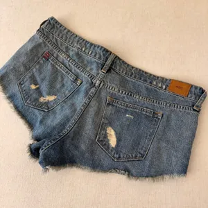 BDG Urban Outfitters Low Rise y2k Dolphin Denim Shorts Blue Distressed Women 32W thumbnail 9