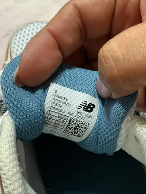 New Balance White Sneakers with Gold and Blue Accents 153 thumbnail 9