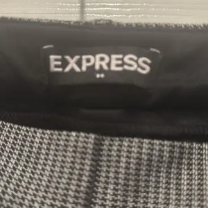 Express Checkered Black and White Mid Rise Ankle Pants thumbnail 4