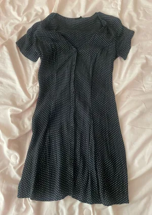 Black polka dot dress with ruffle neckline and short sleeves thumbnail 1