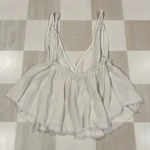 brandy melville riley babydoll flowy white tank top thumbnail 6