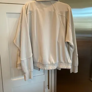 lululemon Softstreme Funnel-Neck Zip Jacket in Off-White thumbnail 4