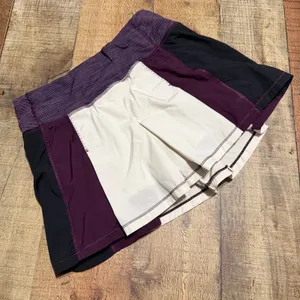 Lululemon Womens Plum Black White Fast Cat Skort Skirt Sz 2 Run Athletic Pockets thumbnail 1