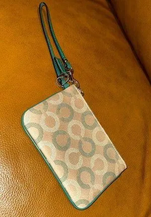 Coach wristlet thumbnail 1