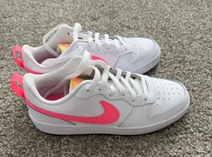Nike White Low-Top Sneakers with Neon Pink Swoosh thumbnail 1