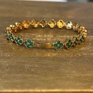 Gold tone emerald clovers tennis bracelet thumbnail 4
