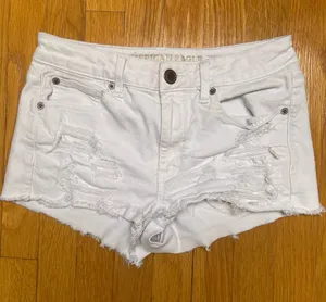 American Eagle Outfitters White Distressed Denim Cutoff Shorts thumbnail 1