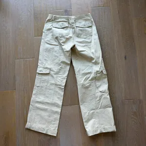 Brandy Melville Women's Cream and Tan Trousers thumbnail 4