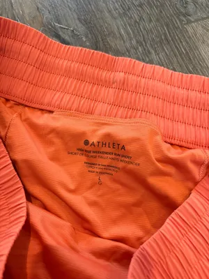 Orange Athleta High Rise Weekender Run Shorts thumbnail 3