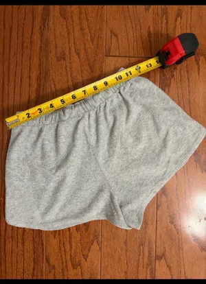 Colsie light gray terry fleece lounge shorts - Size XS. light gray terry fleece lounge shorts feature a comfortable elastic drawstring waistband, curved dolphin hem, and side pockets. Gently warn and in excellent condition. Measurements approximately 11” not fully stretched out from elastic waste x 10” long. Non smoking home. priced to sell at as is condition. Don’t like my price, make reasonable offer! And thank you for checking my closet. thumbnail 7