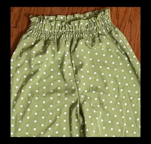 Shein Olive Green high waste Polk dot wide leg pants - Size Small with Bag. Gently warn once and excellent condition. Measurements approximately 12” waste not fully stretched out from elastic waste band x 12” rise x 43” long. None smoking home. Priced to sell at as is condition. Don’t like my price, make reasonable offer. thumbnail 2
