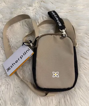 Sherpani Beige and Black Compact Crossbody Pouch brand new thumbnail 1
