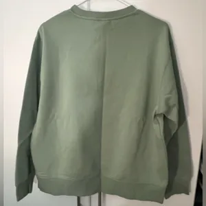 H&M x Disney Sage Green Embossed Mickey Mouse Crewneck Sweatshirt NWOT Medium thumbnail 4