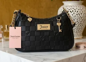Juicy Couture Black Quilted Shoulder Bag with Gold Accents thumbnail 1