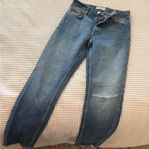 Free People Medium Wash Skinny Jeans with rips thumbnail 1