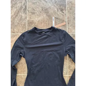 Skims Fits Everybody Long Sleeve Crewneck Bodysuit Onyx Size XS thumbnail 9