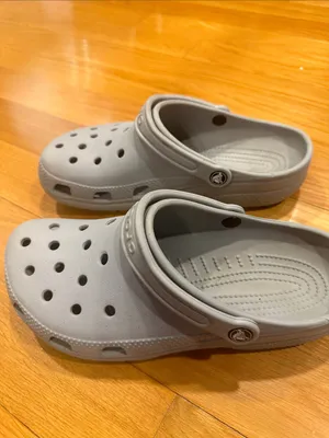 Crocs  unisex gray clogs size men 9 women’s 11. thumbnail 2