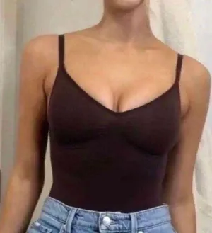 SKIMS Low Back Sculpting Thong Bodysuit thumbnail 1