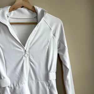 Fabletics white full zip longline jacket women's size small breathable pockets thumbnail 2
