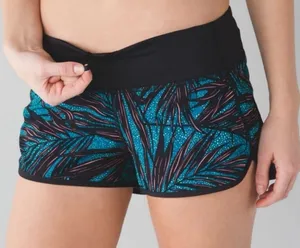 Lululemon Speed Shorts Teal Black Size 6 Lined thumbnail 1