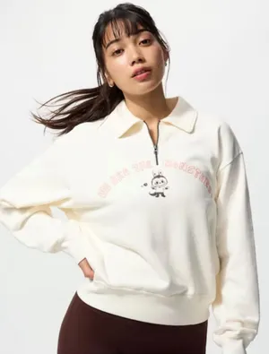 Uniqlo Cream Half-Zip Collared Sweatshirt with Pink Graphic thumbnail 1