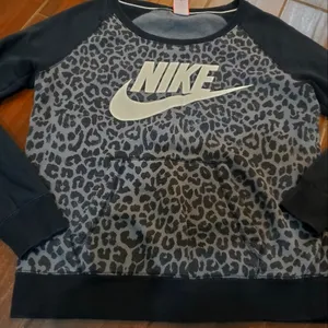 Nike gray and black Crewneck sweatshirt size Medium women's thumbnail 1