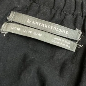 Anthropologie Black Embroidered Cotton Midi Dress Smocked Waist Pom Pom Trim 12 thumbnail 7