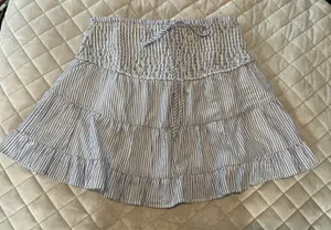 Francesca’s Blue and white stripped skirt with gold accents thumbnail 1