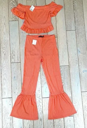 Urban Outfitters Ribbed Ruffle 2-Piece Set - Off-The-Shoulder & Flare Pants thumbnail 1