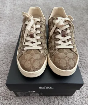 Coach Women’s Monogram Low-Top Sneakers in Khaki and Cream thumbnail 1