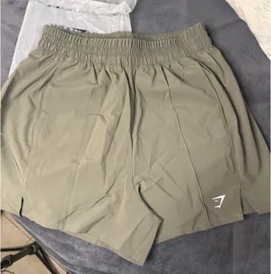 Gymshark green shorts size small thumbnail 1