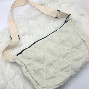 Quilted Nylon Crossbody Hobo Bag in Cream thumbnail 1