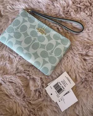 💙Coach Corner Zip Wristlet CEY93 Light Blue Signature Canvas-Smooth Leather NWT thumbnail 1