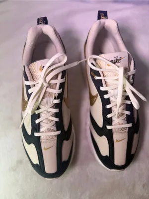 Nike Women's White Black Sneakers with Metallic Gold Swoosh thumbnail 4