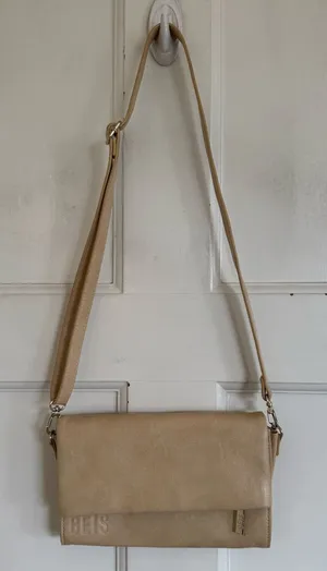 Beis The Travel Wallet Bag in beige vegan‎ leather. thumbnail 1
