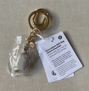 Lululemon Everywhere Belt Bag Charm Keychain - Beech White/Gold thumbnail 1